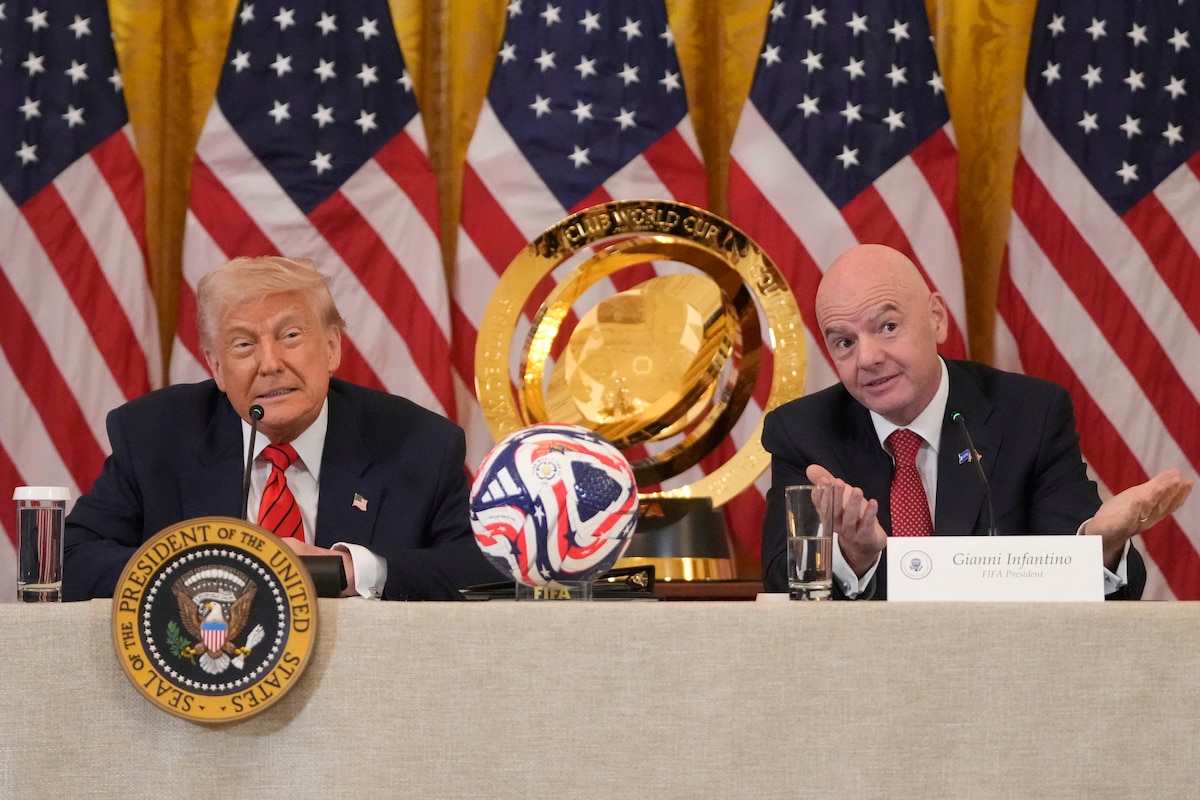 President Donald Trump listens as FIFA President Gianni Infantino speaks during a FIFA task force meeting on the 2026 FIFA World Cup in the East Room of the White House, Tuesday, May 6, 2025, in Washington. (AP Photo/Mark Schiefelbein)