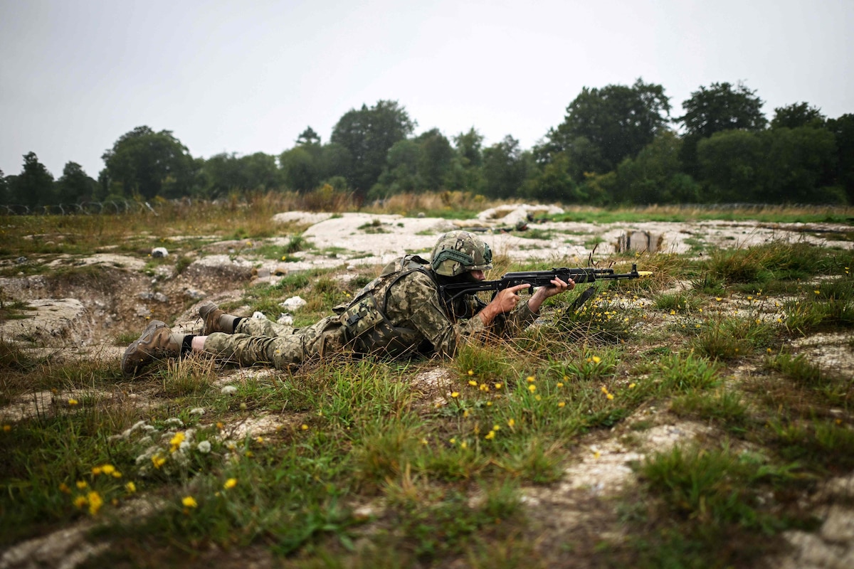 A Ukrainian soldier takes part in a casualty simulation training excercise operated by Britain's armed forces, as part of the Interflex programme, in southern England, on August 22, 2024. British Prime Minister Keir Starmer's commitment to Ukraine "remains absolutely resolute", his spokesperson said August 19, 2024, after Ukrainian President Volodymyr Zelensky suggested that UK support "has slowed down recently". Britain has been one of Kyiv's biggest backers in its fight against Russia's invasion, and London insisted its position has not changed since Ukrainian forces launched an offensive in Russia's Kursk region earlier this month. (Photo by Justin TALLIS / AFP)