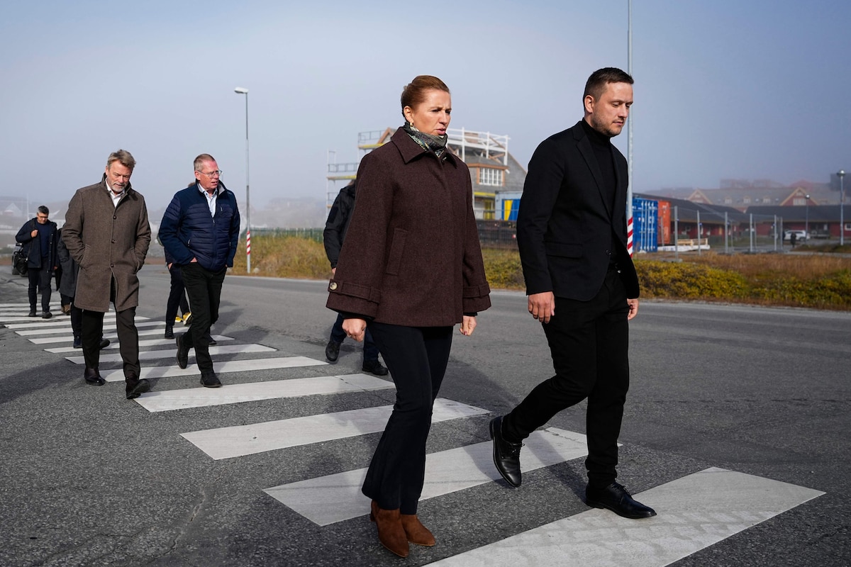 Greenlands head of government, Jens-Frederik Nielsen (R) and Denmark's Prime Minister Mette Frederiksen arrive at the Katuaq cutural house in Nuuk, Greeland, on September 24, 2025. Danish Prime Minister Mette Frederiksen visits Denmark's autonomous territory Greenland on September 24, 2025 to apologise in person to the victims of a forced contraception programme that Copenhagen ran for more than three decades.
From the late 1960s until 1992, Danish authorities forced around 4,500 Inuit women, around half of those of child-bearing age, to wear a contraceptive coil -- or intrauterine device (IUD) -- without their consent. The aim was to reduce the Inuit birth rate. (Photo by Mads Claus Rasmussen / Ritzau Scanpix / AFP) / Denmark OUT