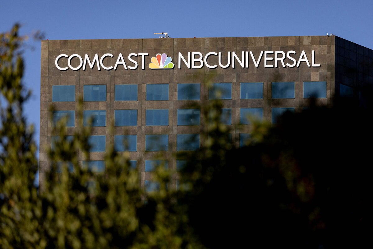 (FILES) The Comcast NBCUniversal building is seen in Los Angeles, California, November 20, 2024. US cable giant Comcast said on June 29, 2026, that it would spin off its NBCUniversal and Sky media divisions into a separate company, aiming to unlock value as standalone players in two highly competitive sectors. (Photo by ETIENNE LAURENT / AFP)