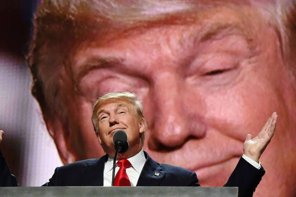 (FILES) This file photo taken on July 21, 2016 shows Republican presidential candidate Donald Trump addresses delegates at the end of the last day of the Republican National Convention in Cleveland, Ohio. Donald Trump said on November 9, 2016 he would bind the nation's deep wounds and be a president "for all Americans," as he praised his defeated rival Hillary Clinton for her years of public service. / AFP PHOTO / Timothy A. CLARY