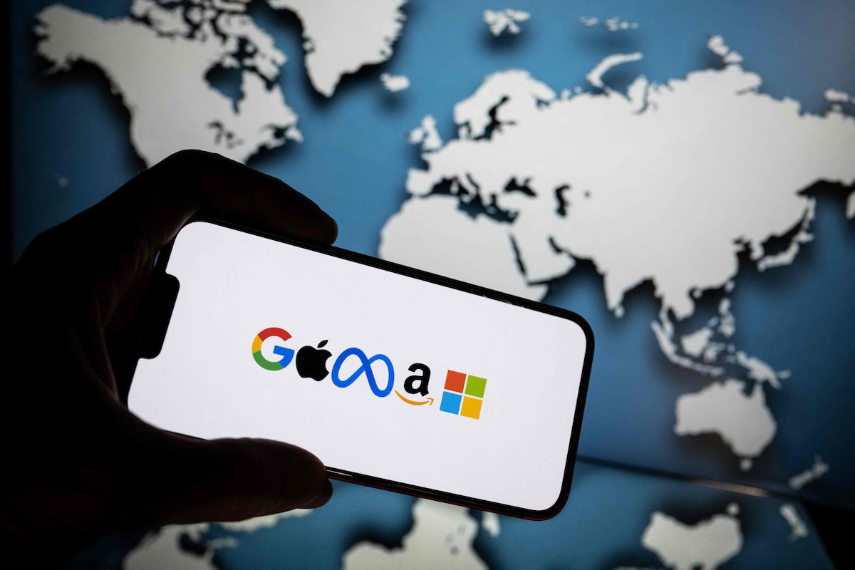 A picture shows logos of the main communication brand also named GAFAM (for Google, Apple, Facebook, Amazon and Microsoft)in Mulhouse, on June 2, 2023. (Photo by SEBASTIEN BOZON / AFP)