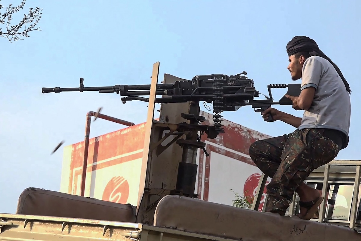 This frame grab taken from AFPTV video footage on September 9, 2026, shows a member of the Saudi-backed Yemeni government forces firing a heavy machine gun during clashes with Houthi fighters in the Al-Kadha area, west of Taiz province, on September 8, 2026. Deadly fighting reignited in Yemen last week, when the Houthis launched a major campaign to seize territory near the Bab al-Mandab strait. The strait has become an increasingly important route for Saudi oil since Iran blockaded the Strait of Hormuz, choking Gulf exports. (Photo by AFPTV / AFP) /