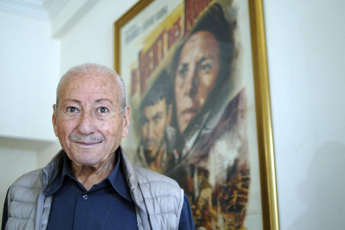 (FILES) Algerian film director Mohammed Lakhdar-Hamina poses for a picture at his home in Hydra in the capital Algiers, on February 11, 2017. Algerian director and producer Mohamed Lakhdar Hamina, the only Arab and African filmmaker to win a Palme d'Or award in Cannes, died on May 25, 2025 at the age of 95, his family announced. (Photo by AFP)