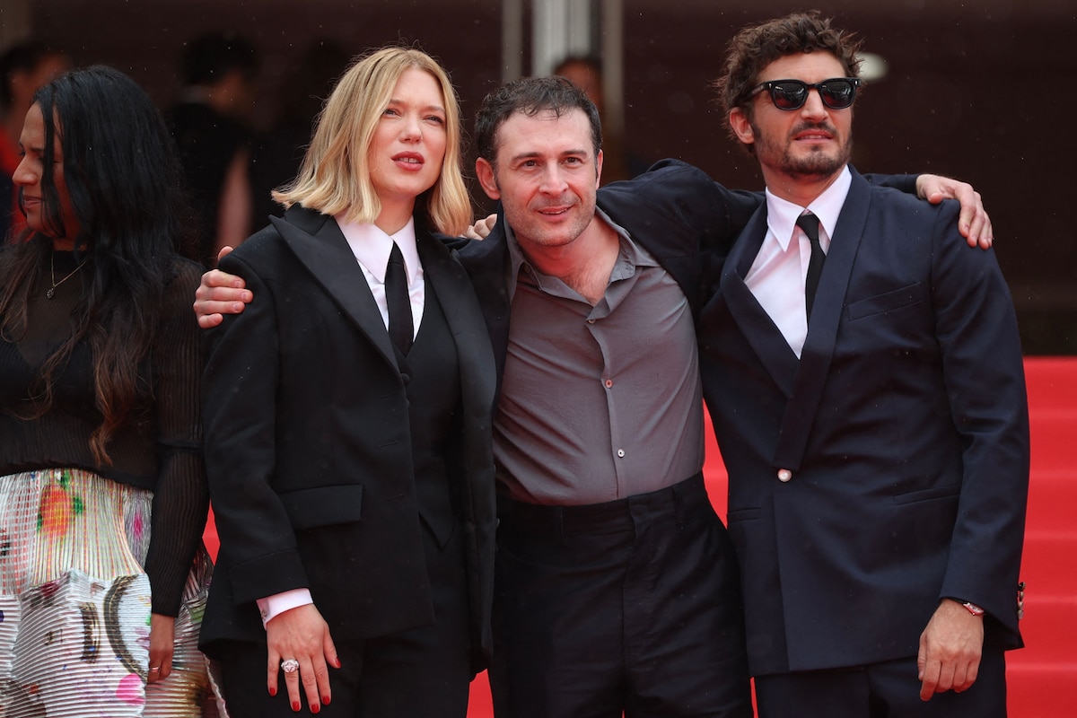 (From L) French actress Lea Seydoux, French director and screenwriter Arthur Harari and French-Canadian actor Niels Schneider arrive for the screening of the film "L'Inconnue" (The Unknown) at the 79th edition of the Cannes Film Festival in Cannes, southern France on May 18, 2026. (Photo by Valery HACHE / AFP)