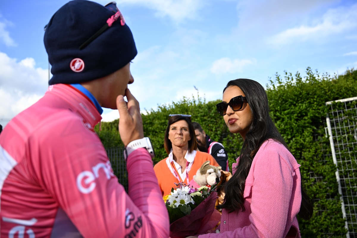 Belgian Remco Evenepoel of Soudal Quick-Step wearing the pink jersey (maglia rosa) of leader in the overall ranking celebrates with his mother Agna Van Eeckhout (C) and his wife Oumaima Oumi Rayane (R) after the stage nine of the 2023 Giro D'Italia cycling race, an individual time trial from Savignano sul Rubicone to Cesena (35km), in Italy, Sunday 14 May 2023. The 2023 Giro takes place from 06 to 28 May 2023.
BELGA PHOTO JASPER JACOBS