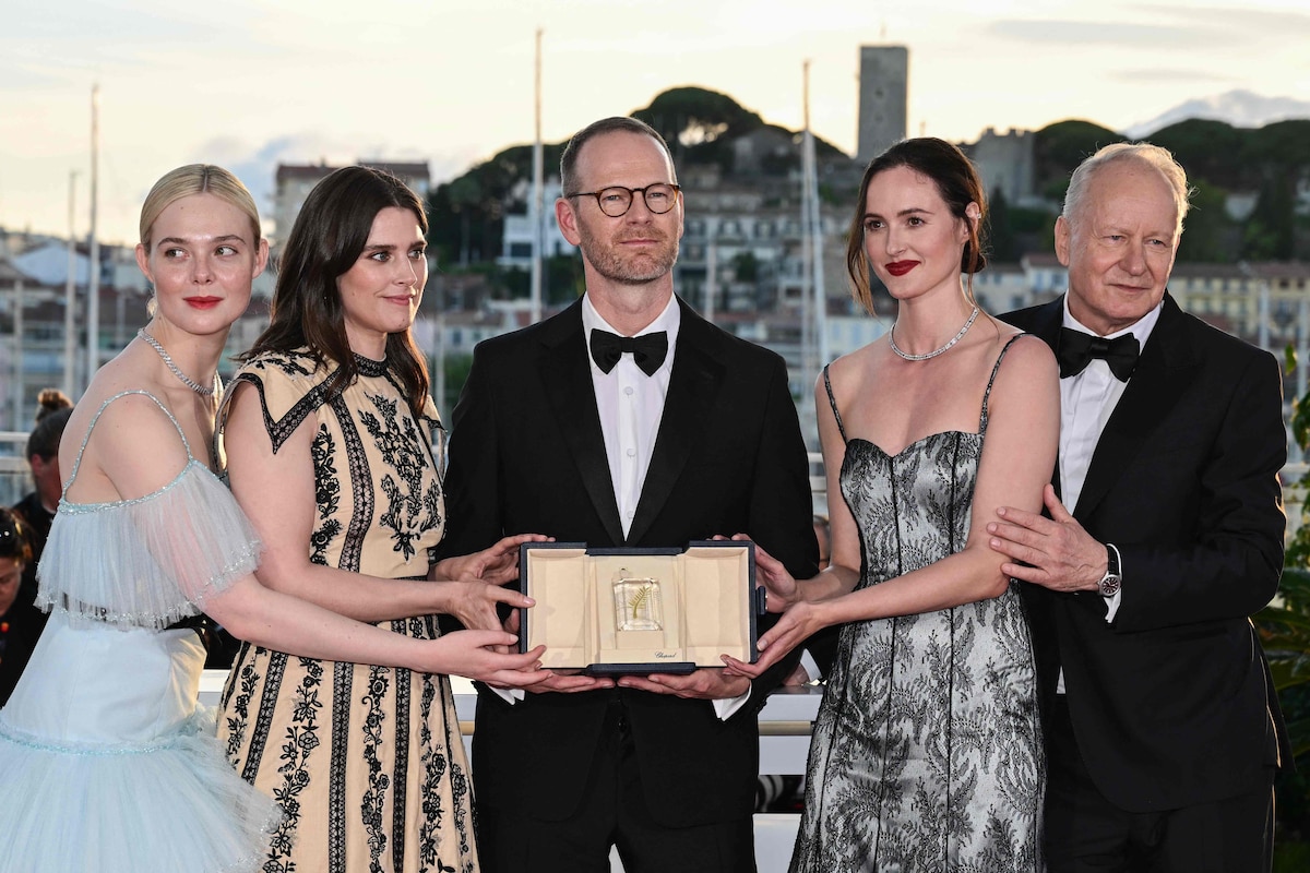 (FILES) Norwegian director and screenwriter Joachim Trier (C) poses with (from L) US actress Elle Fanning, Norwegian actress Inga Ibsdotter Lilleaas, Norwegian actress Renate Reinsve and Swedish actor Stellan Skarsgard during a photocall after winning the Grand Prix for the film "Affeksjonsverdi" (Sentimental Value) during the closing ceremony at the 78th edition of the Cannes Film Festival in Cannes, southern France, on May 24, 2025. The movie "Affeksjonsverdi" (Sentimental Value) awarded with the Grand Prix at the 78th edition of the Cannes Film Festival runs from August 13, 2025 at the cinema, in Paris, on August 12, 2025. (Photo by Miguel MEDINA / AFP)